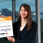 Dr Tamsin Cargill holds her certificate