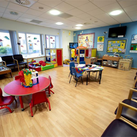 An waiting room with some childrens toys.