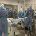 A picture of NHS colleagues in PPE taking part in a simulation exercise