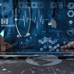 Clinician's hands on a horizontal digital screen display