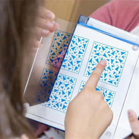 Child choosing their option from a vision assessment