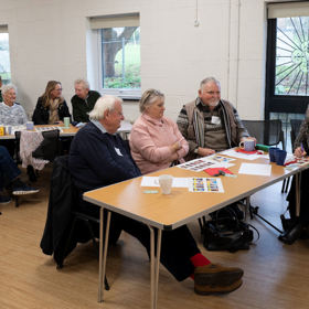 A table of delegates discussing something