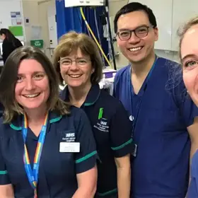 Group of smiling clinicians.