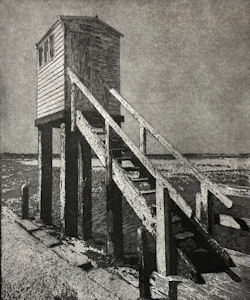 Atmospheric black and white etching of a wooden hut on stilts, steps leading up to it, with the sea behind