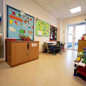 Robin's play room, showing toys and a table and chairs.