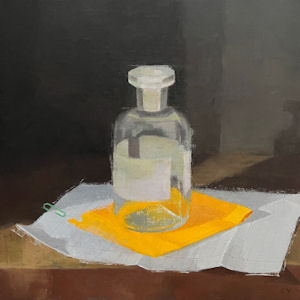 Oil painting of stoppered glass bottle with label resting on scrap of fabric
