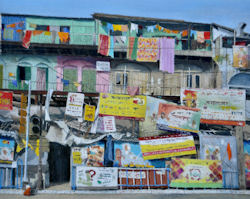 Pastel artwork of Indian streetfront houses with laundry and multiple banners strung from balconies