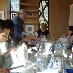 A group of people sat around a table.